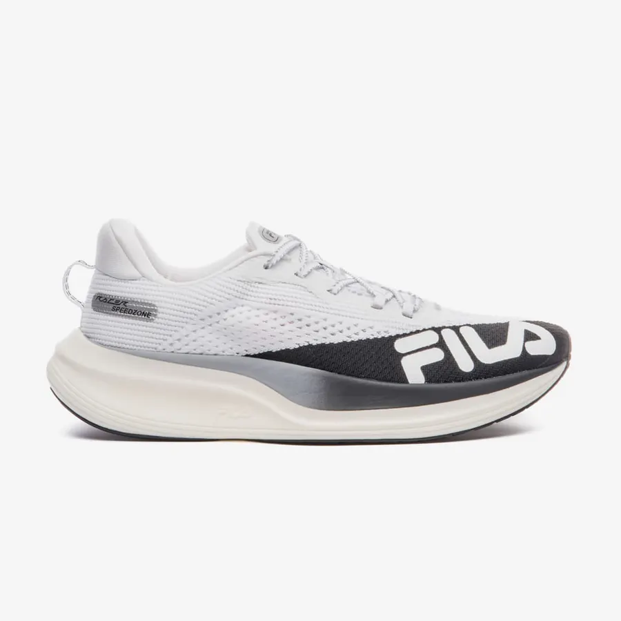 Tênis Fila Racer Speedzone, primeira geração, branco e preto em vista lateral